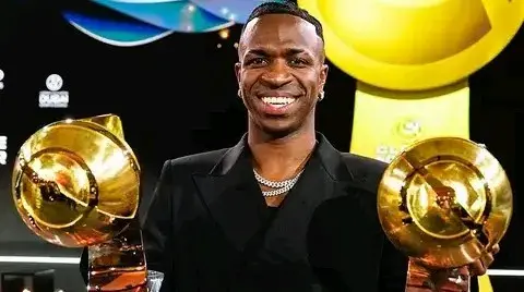 Vinicius Jr holding Globe Soccer Awards