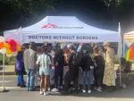 People seeking assistance in the tent of Doctors Without Borders